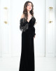 Women's evening dress decorated with a silver fringe