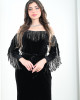 Women's evening dress decorated with a silver fringe