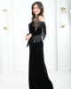 Women's evening dress decorated with a silver fringe